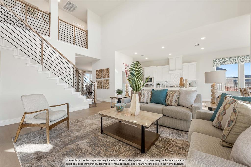 3825 Eagles Bluff Road Midlothian, TX 76065 - Photo 17 of 34 a living room with furniture and a rug