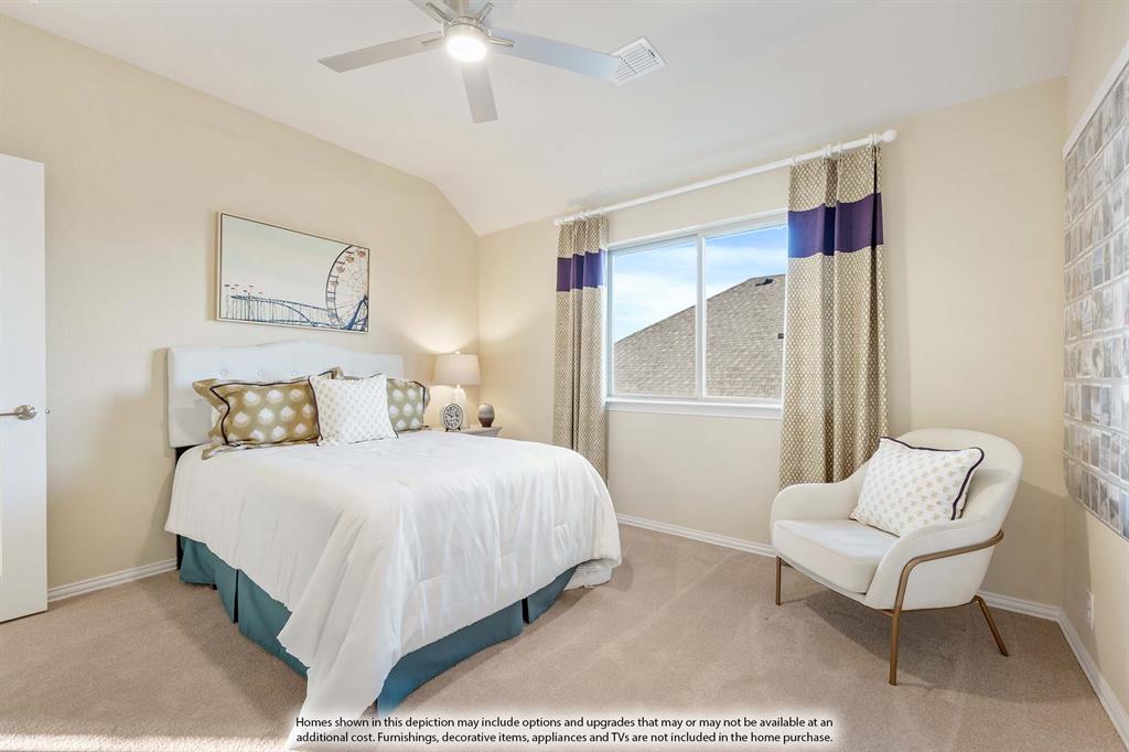 3825 Eagles Bluff Road Midlothian, TX 76065 - Photo 29 of 34 a bedroom with a bed and a chair