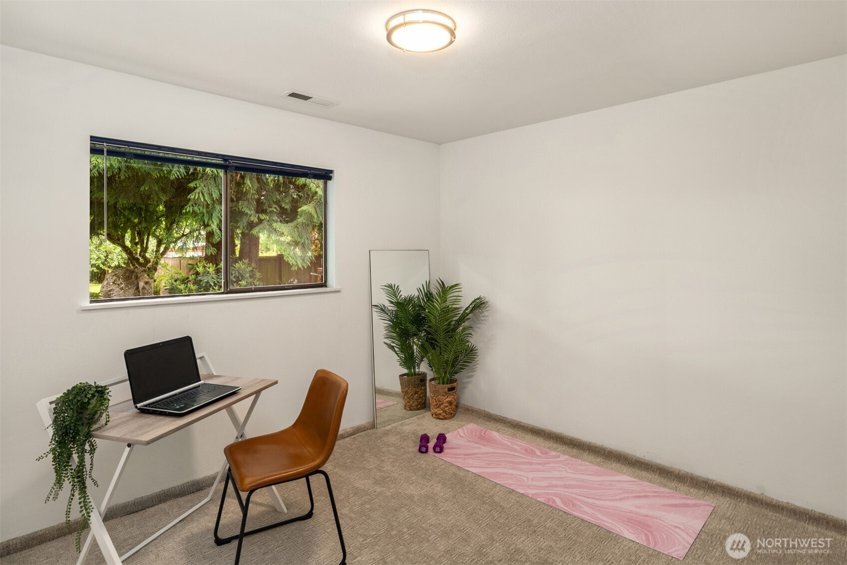 418 212th Street Southwest Bothell, WA 98021 - Photo 26 of 40 a living room with furniture and a potted plant