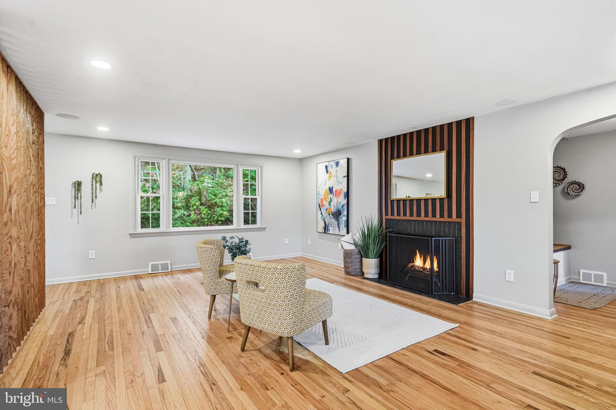 270 Jug Hollow Road Phoenixville, PA 19460 - Photo 11 of 59 a living room with furniture and a fireplace