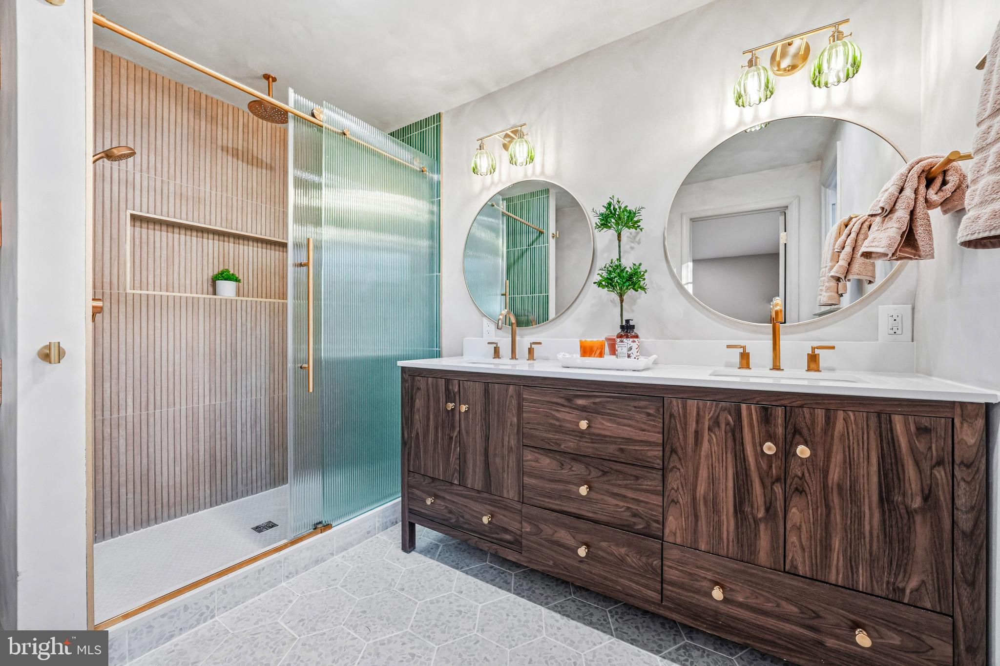 270 Jug Hollow Road Phoenixville, PA 19460 - Photo 27 of 59 a bathroom with a sink a mirror and a shower
