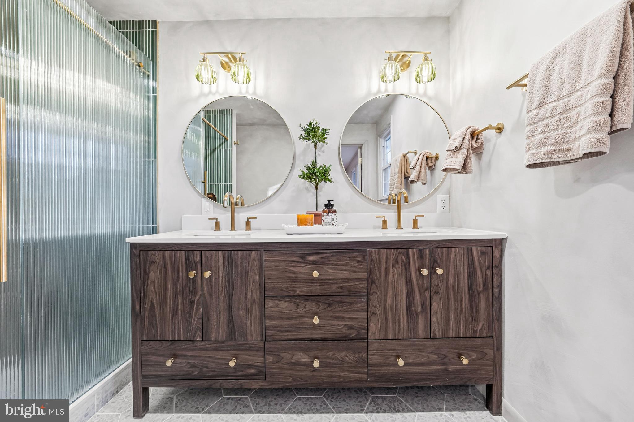 270 Jug Hollow Road Phoenixville, PA 19460 - Photo 30 of 59 a bathroom with a sink a vanity and a mirror
