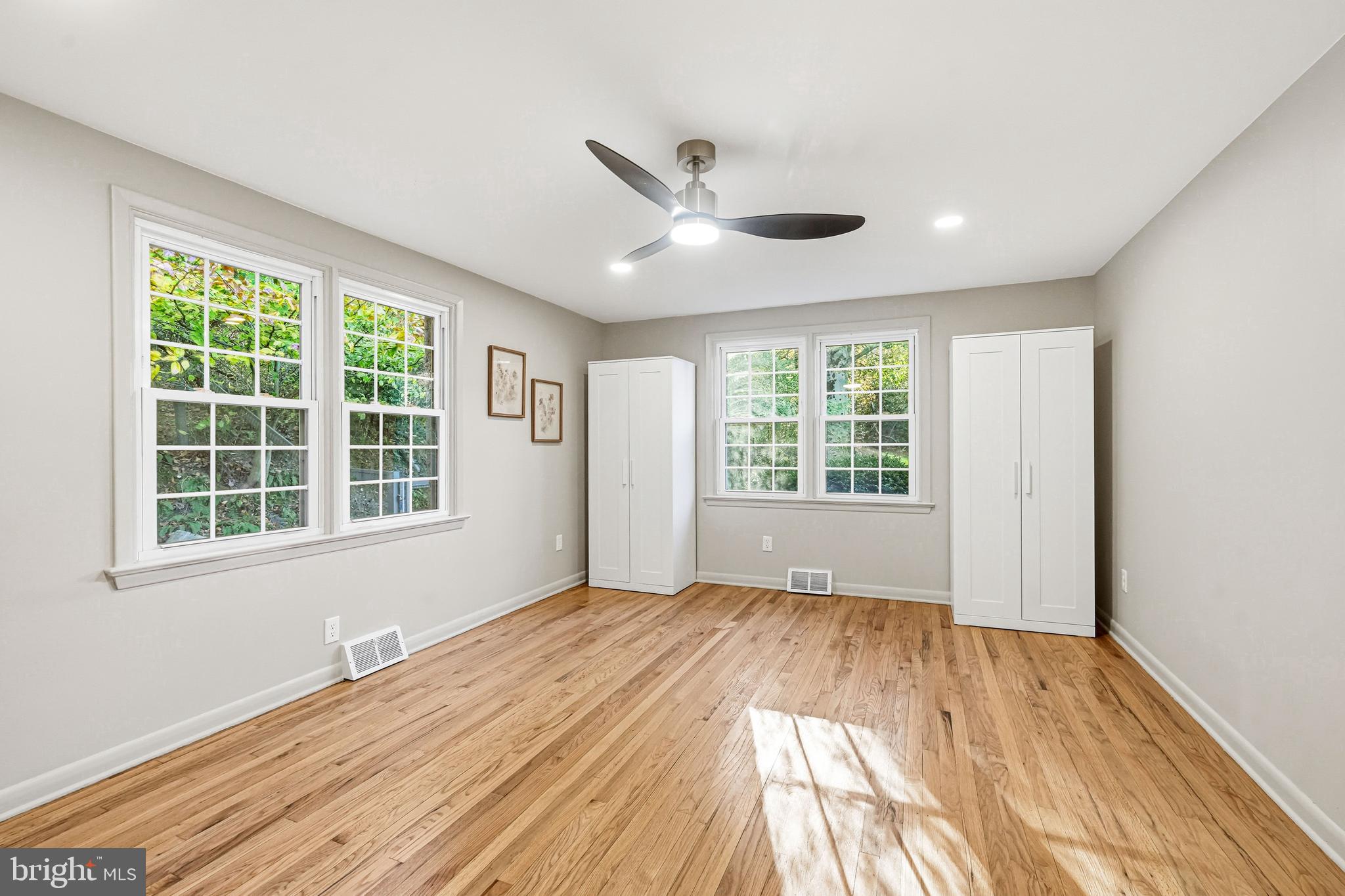 270 Jug Hollow Road Phoenixville, PA 19460 - Photo 34 of 59 a view of an empty room with a window and wooden floor