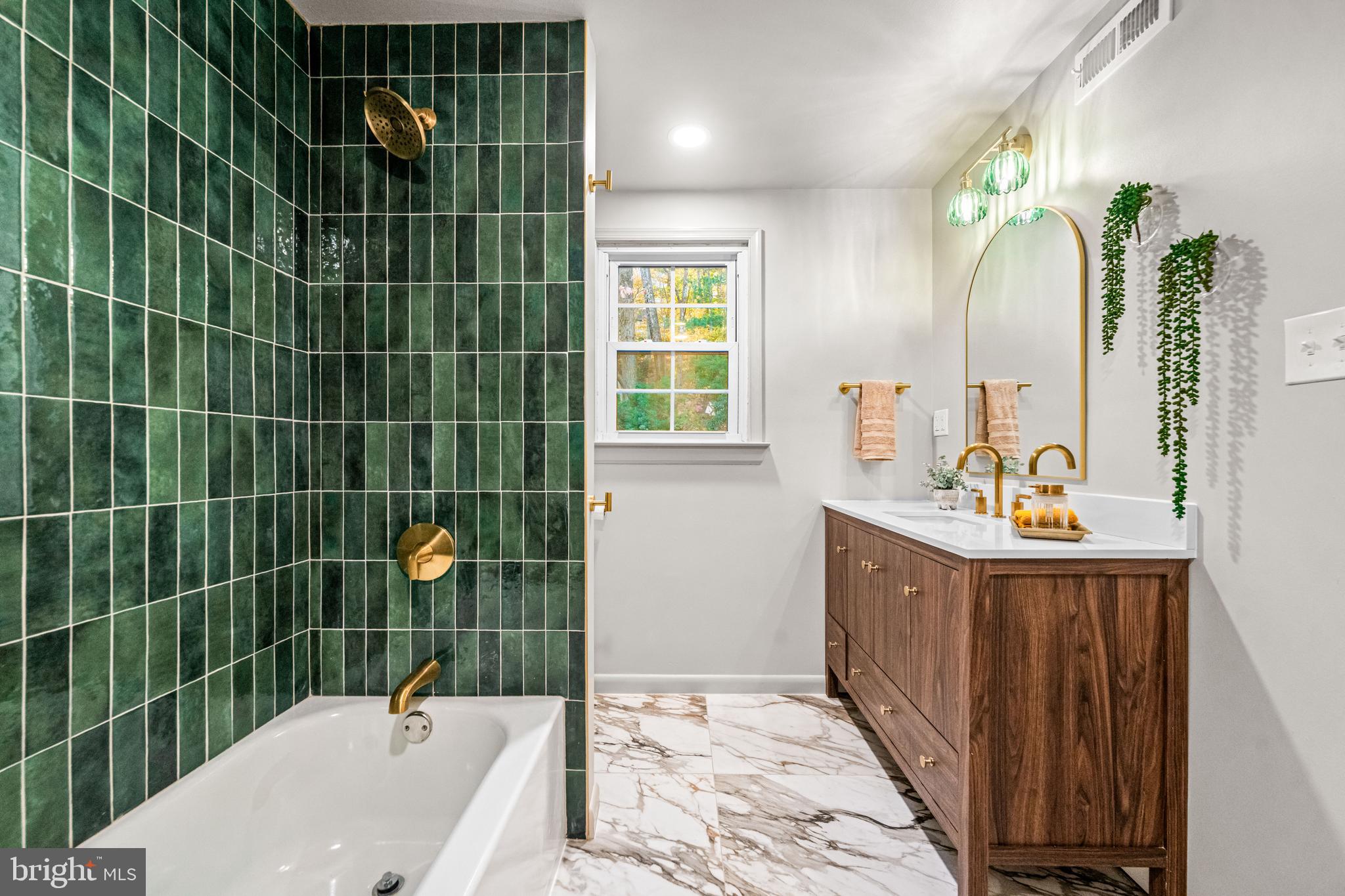 270 Jug Hollow Road Phoenixville, PA 19460 - Photo 37 of 59 a bathroom with a sink and mirror