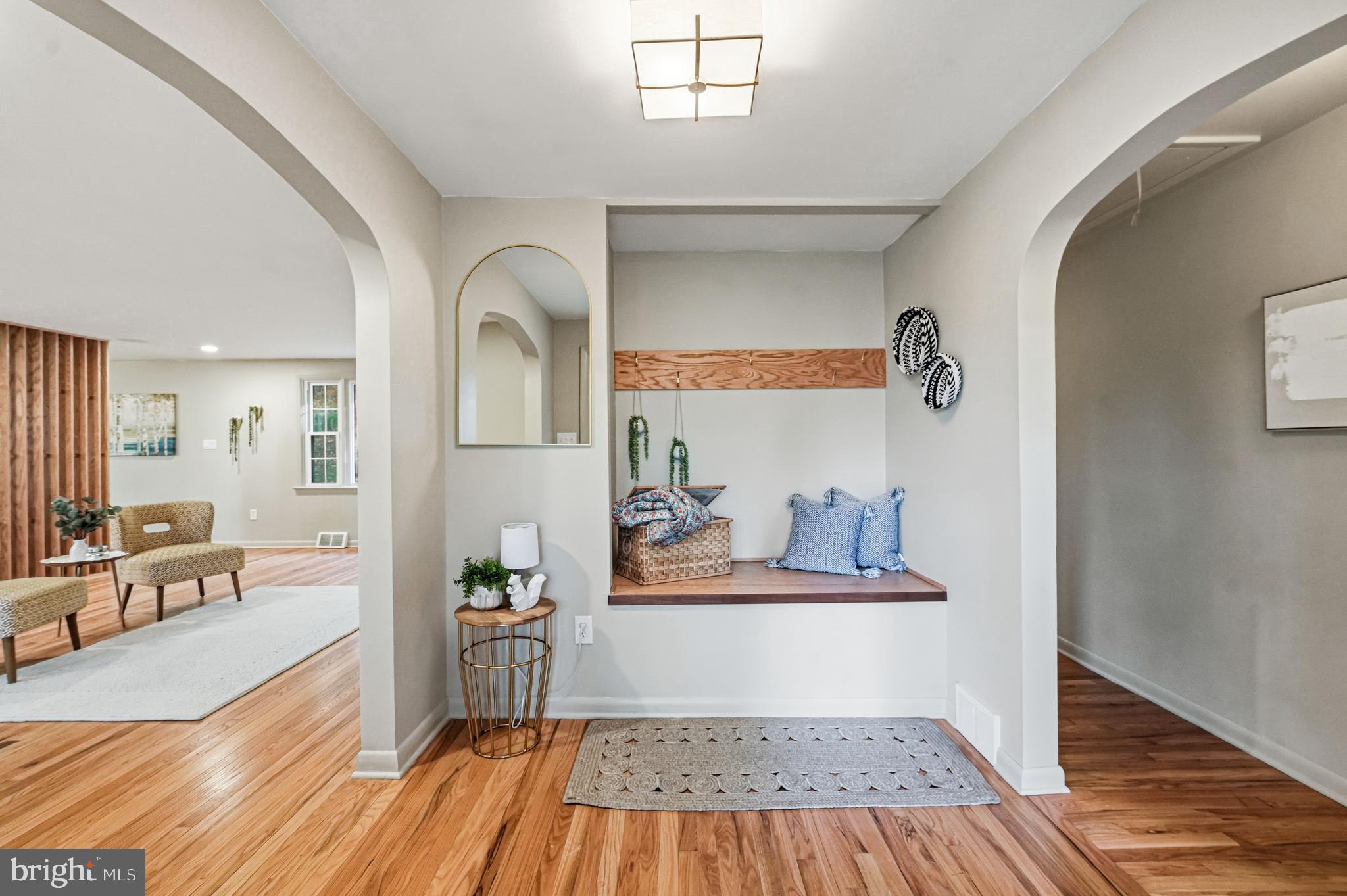270 Jug Hollow Road Phoenixville, PA 19460 - Photo 8 of 59 a living room with furniture and a wooden floor