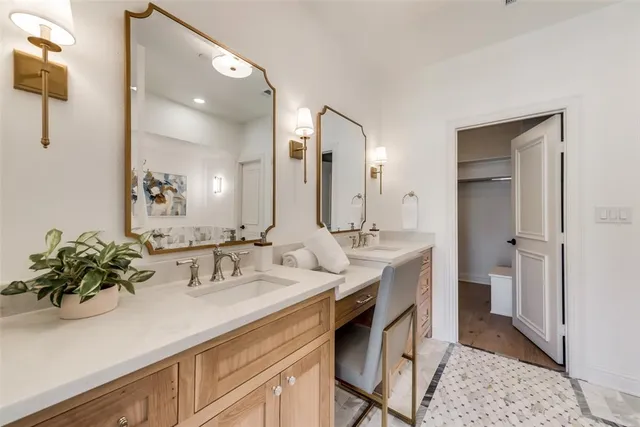 a spacious bathroom with a bathtub and shower