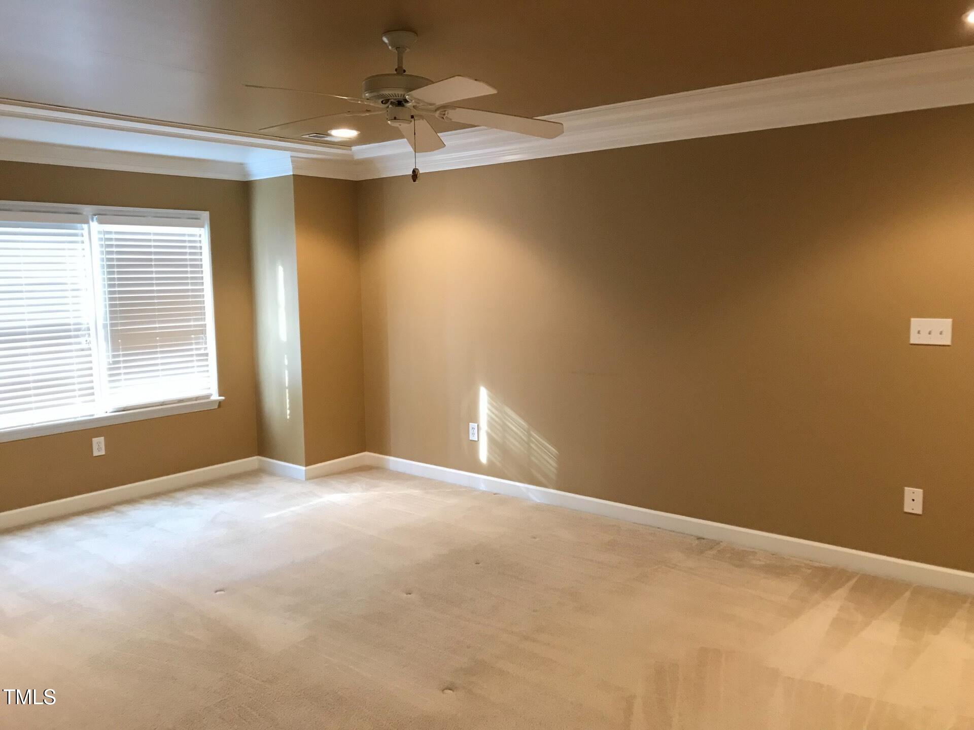 5300 Goldenglow Way Raleigh, NC 27606 - Photo 12 of 24 a view of an empty room with a window