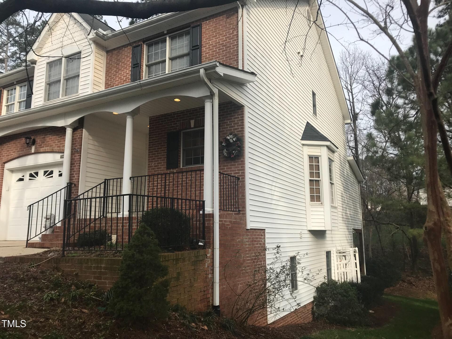 5300 Goldenglow Way Raleigh, NC 27606 - Photo 2 of 24 a view of a house with a yard