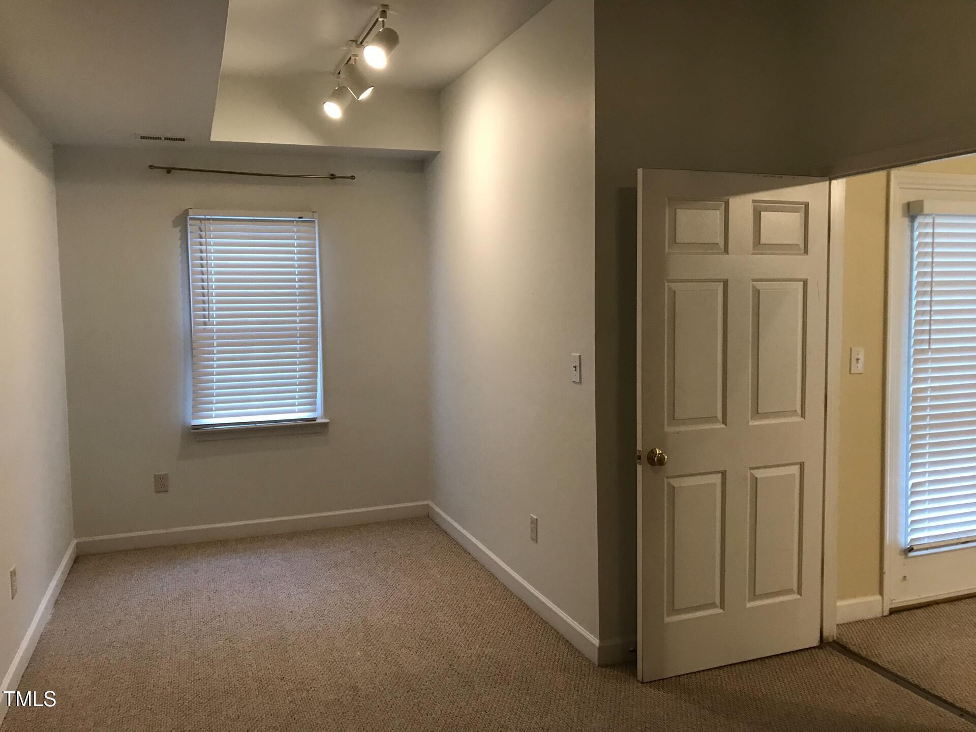 5300 Goldenglow Way Raleigh, NC 27606 - Photo 22 of 24 a view of hallway with window