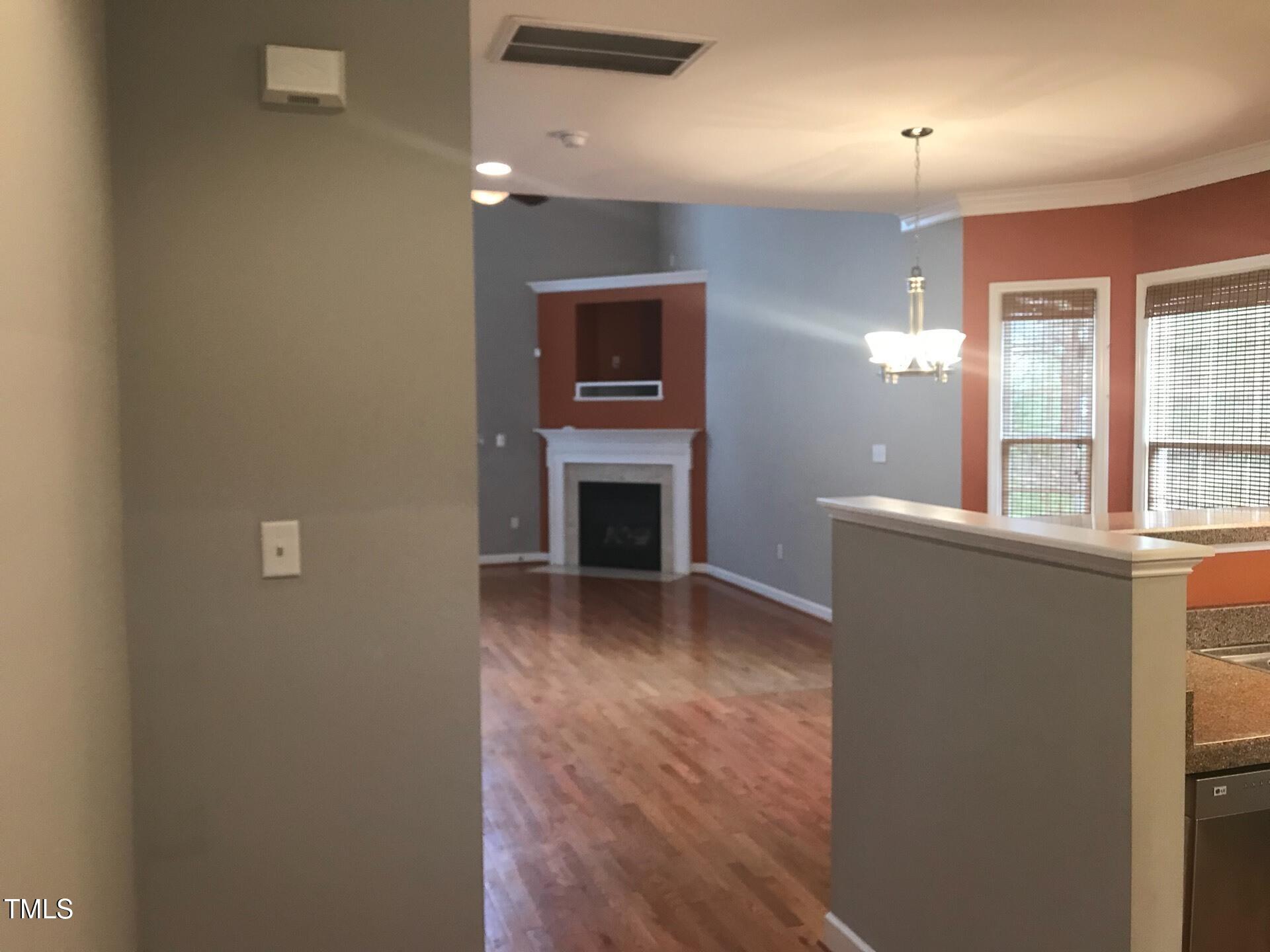 5300 Goldenglow Way Raleigh, NC 27606 - Photo 3 of 24 a view of livingroom with kitchen