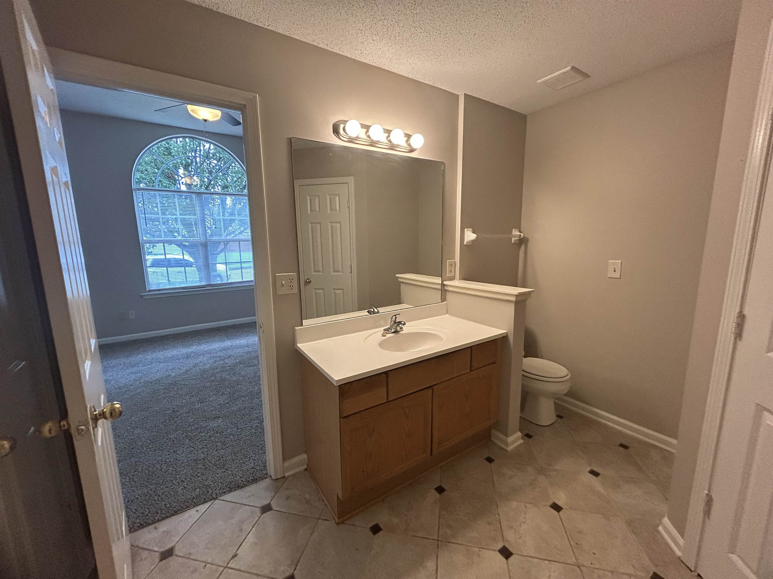 3912 Sundale Way West Memphis, TN 38135 - Photo 11 of 25 a bathroom with a sink a toilet and shower