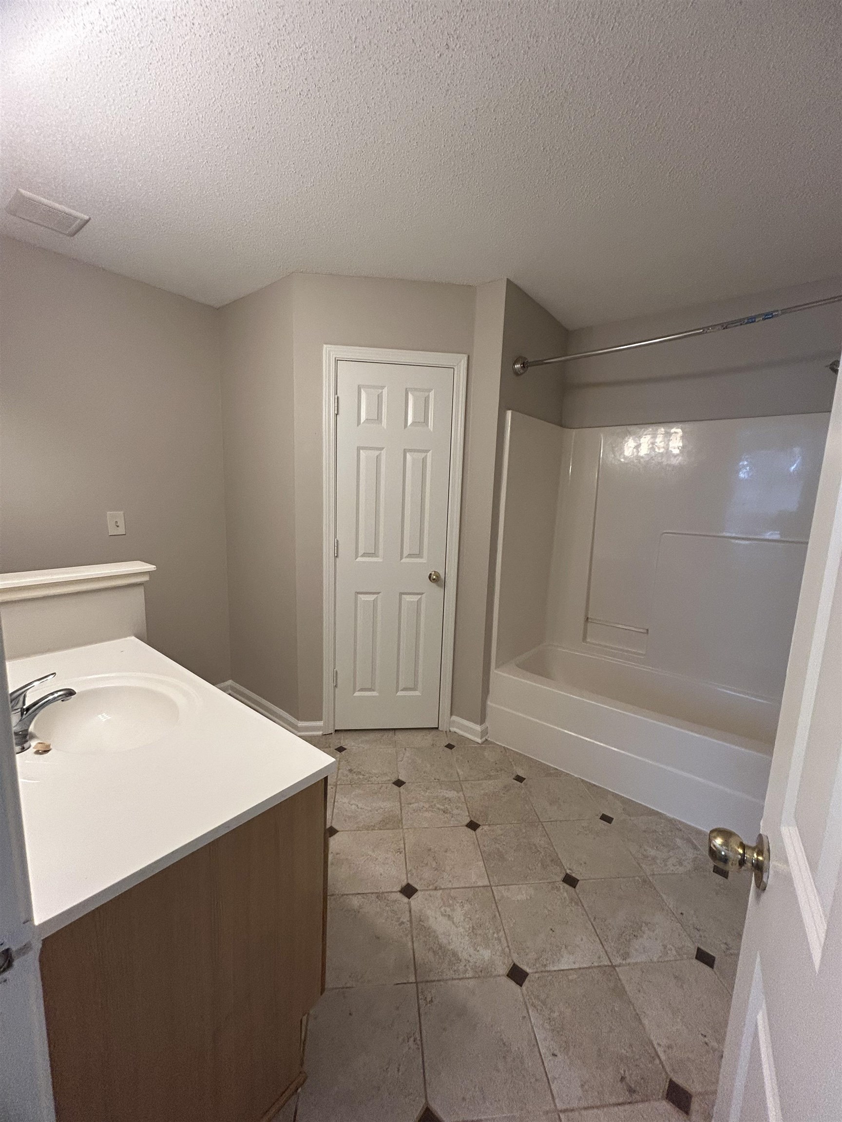3912 Sundale Way West Memphis, TN 38135 - Photo 12 of 25 a bathroom with a sink a toilet and shower