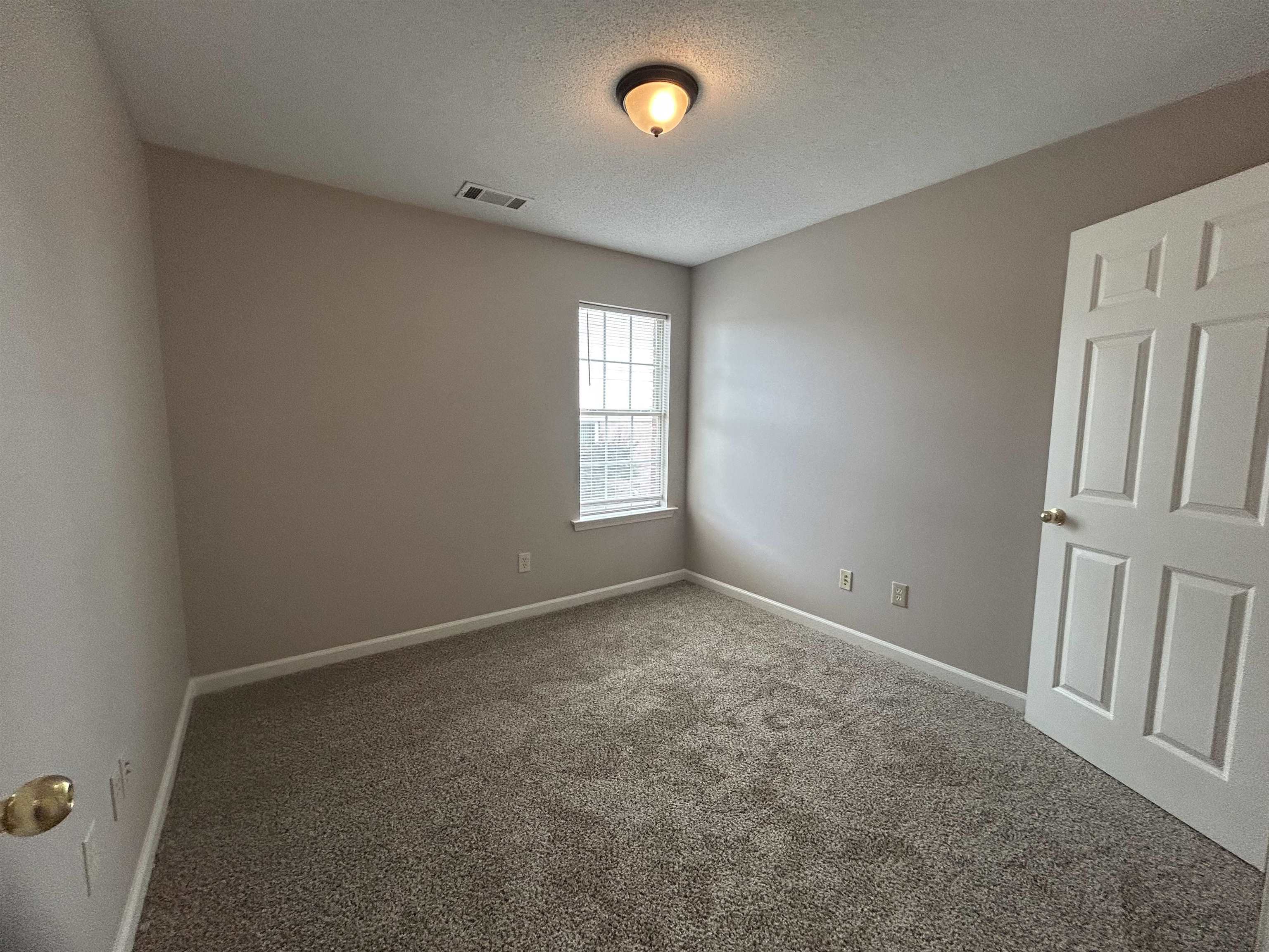 3912 Sundale Way West Memphis, TN 38135 - Photo 18 of 25 an empty room with windows and closet