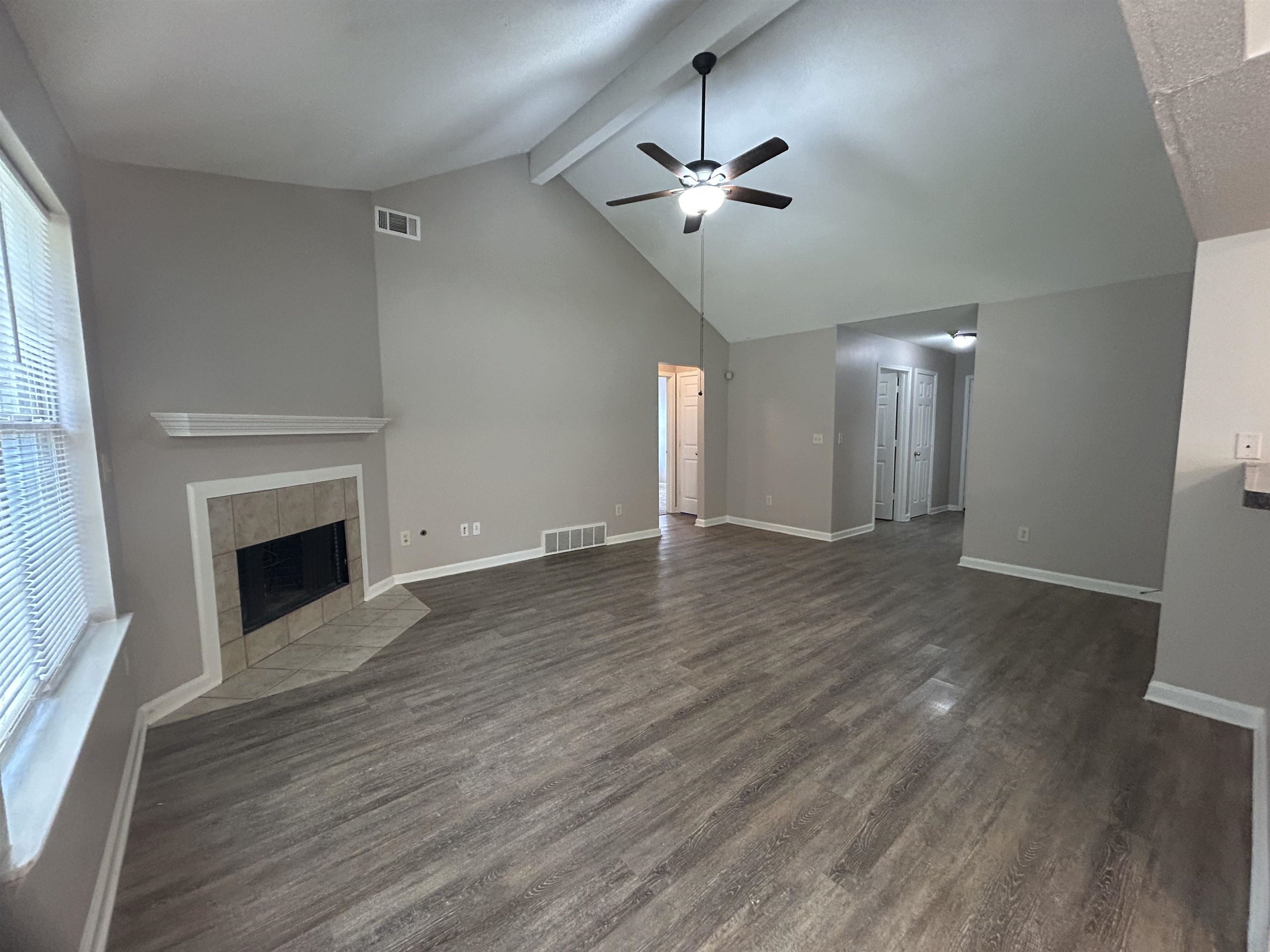 3912 Sundale Way West Memphis, TN 38135 - Photo 4 of 25 a view of an empty room with wooden floor and a fireplace