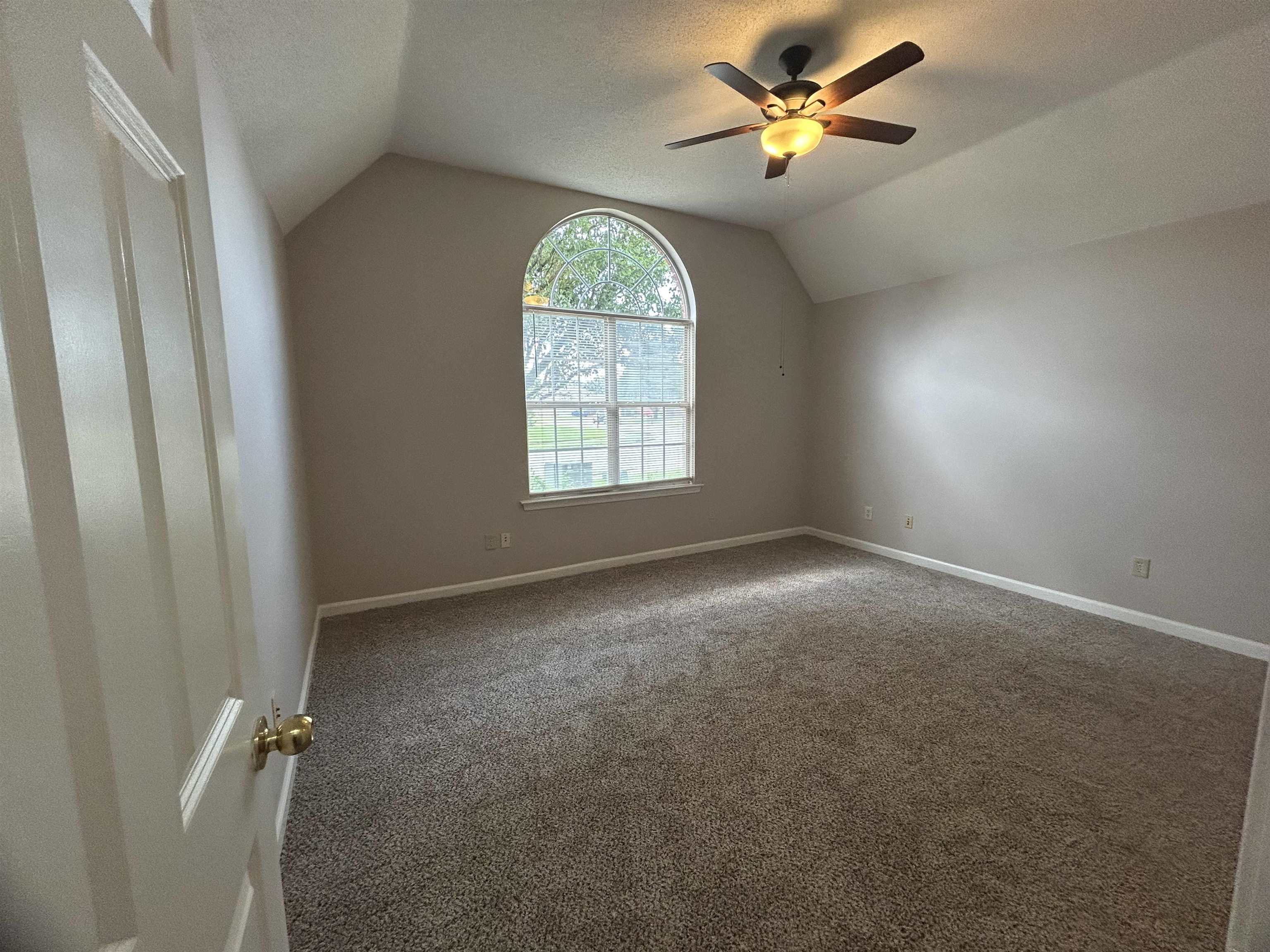 3912 Sundale Way West Memphis, TN 38135 - Photo 9 of 25 an empty room with a window and a fan