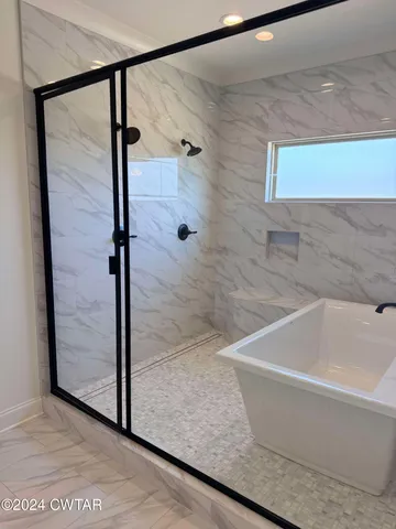 a bathroom with a bathtub