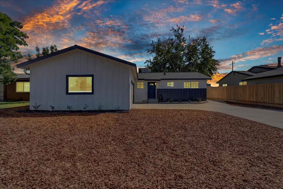 8685 Eddy Street Hanford, CA 93230 - Photo 2 of 45 a house with trees in the background