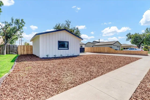 a house view with a outdoor space