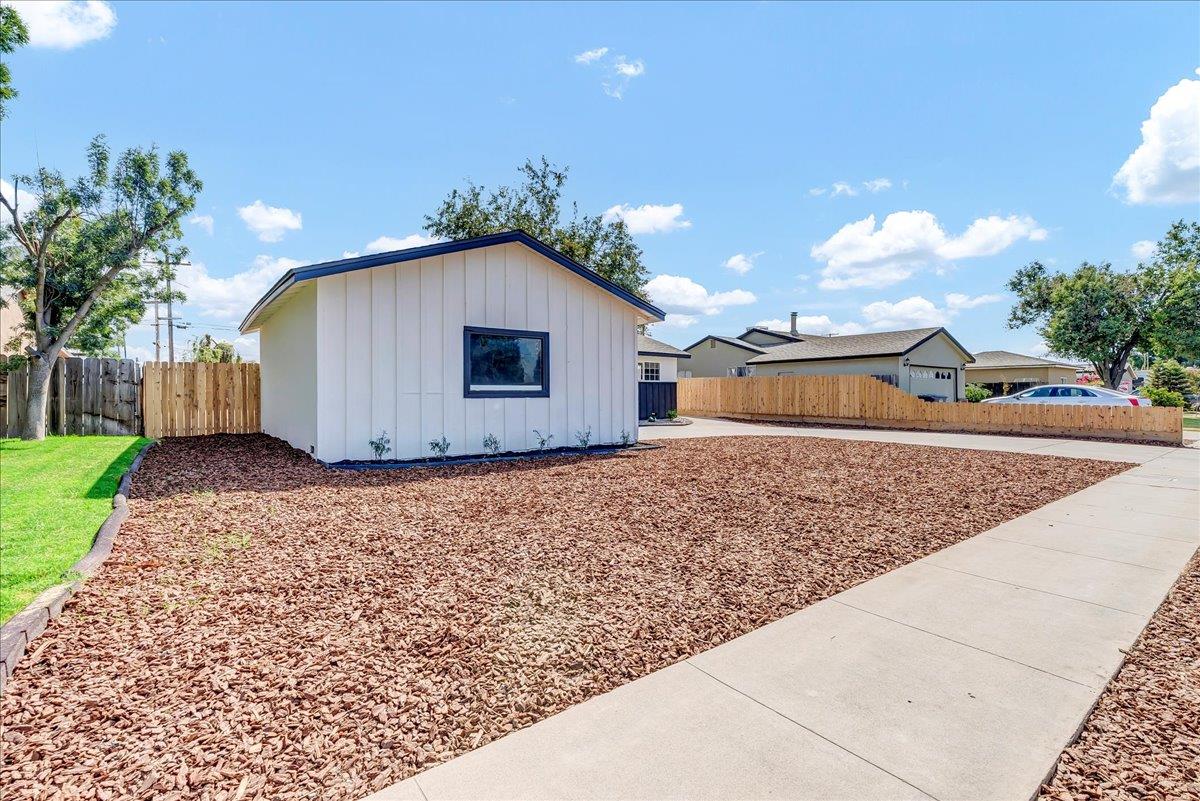 8685 Eddy Street Hanford, CA 93230 - Photo 37 of 45 a house view with a backyard space