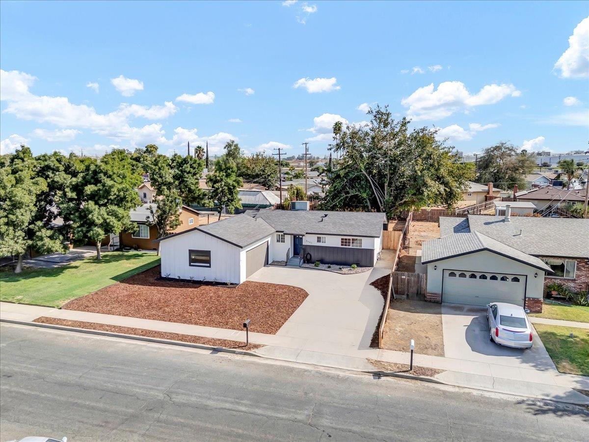 8685 Eddy Street Hanford, CA 93230 - Photo 41 of 45 a view of a house with outdoor space and sitting area