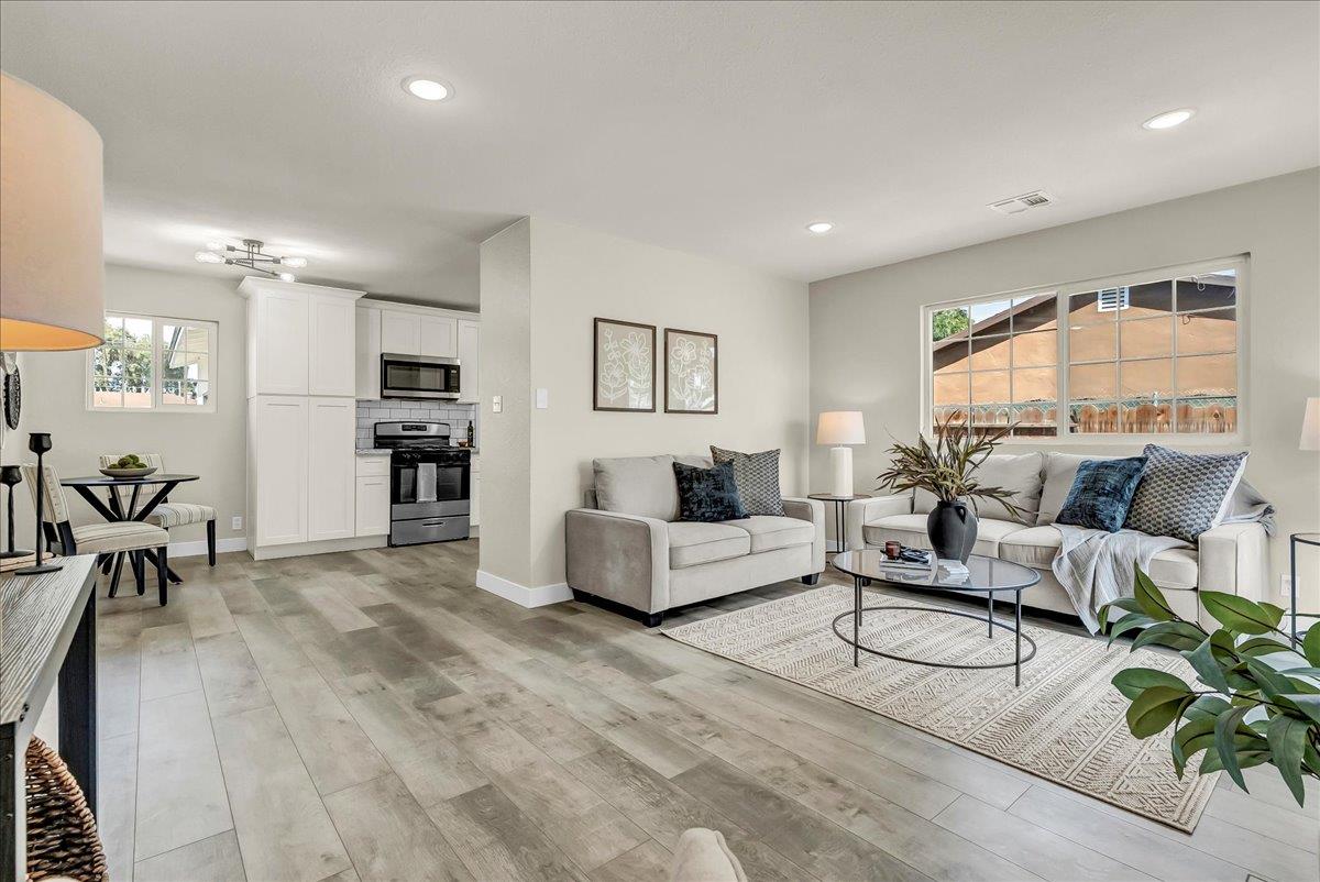 8685 Eddy Street Hanford, CA 93230 - Photo 7 of 45 a living room with furniture and a large window