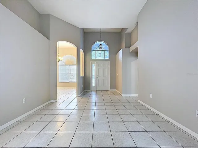 a view of an empty room and window