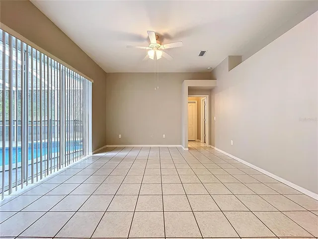 a bathroom with a double vanity sink a mirror and a bathtub