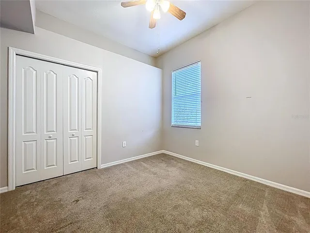 a view of a backyard of a house