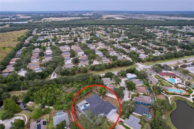 an empty room with windows and wooden door
