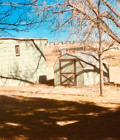 6125 Sayres Road Colorado Springs, CO 80927 - Photo 2 of 2 Storage Building with new roof