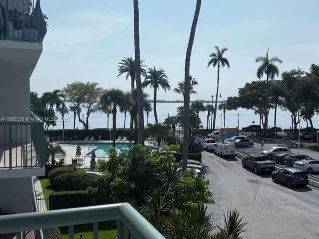 a view of a patio with swimming pool