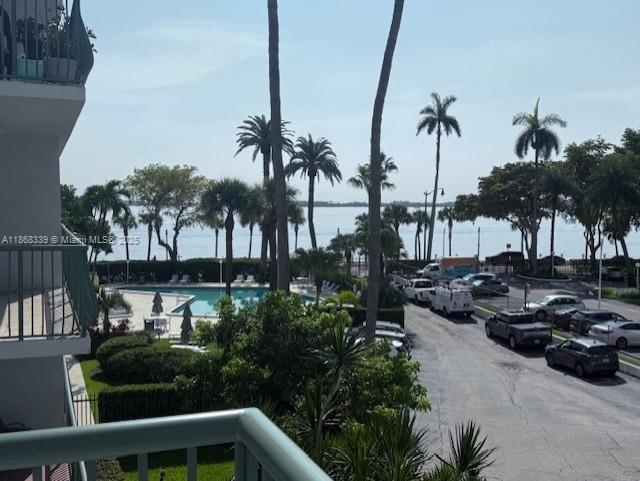 1408 Brickell Bay Drive, Unit 303 Miami, FL 33131 - Photo 16 of 24 a view of a patio with swimming pool