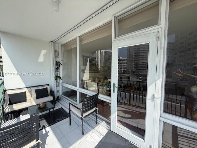 1408 Brickell Bay Drive, Unit 303 Miami, FL 33131 - Photo 17 of 24 a outdoor space with a couch