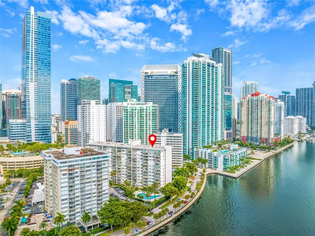 a view of building with outdoor space and swimming pool