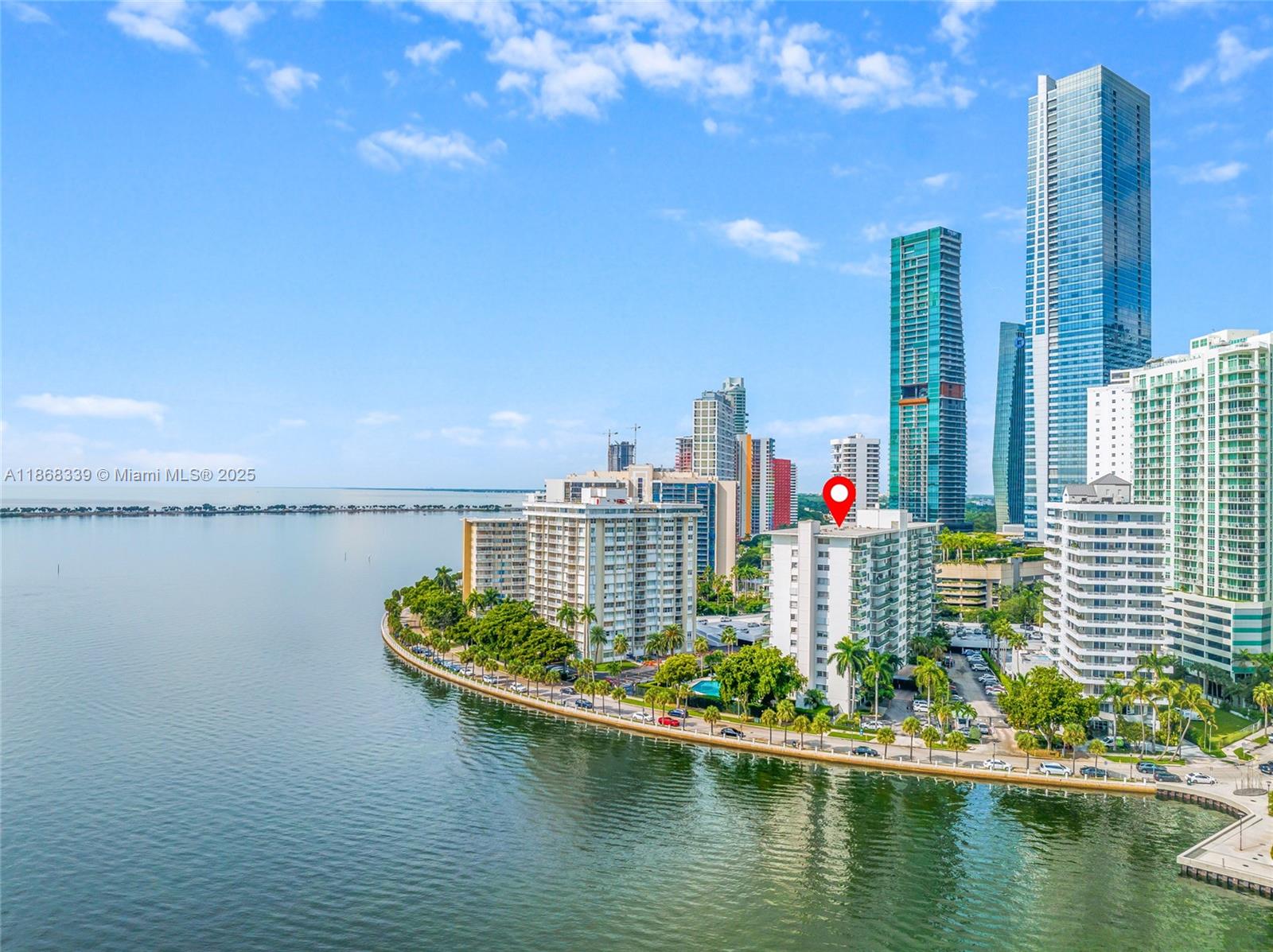 1408 Brickell Bay Drive, Unit 303 Miami, FL 33131 - Photo 23 of 24 a view of a water with a terrace