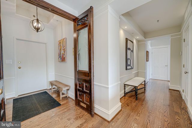 a view of a bedroom with washer and dryer