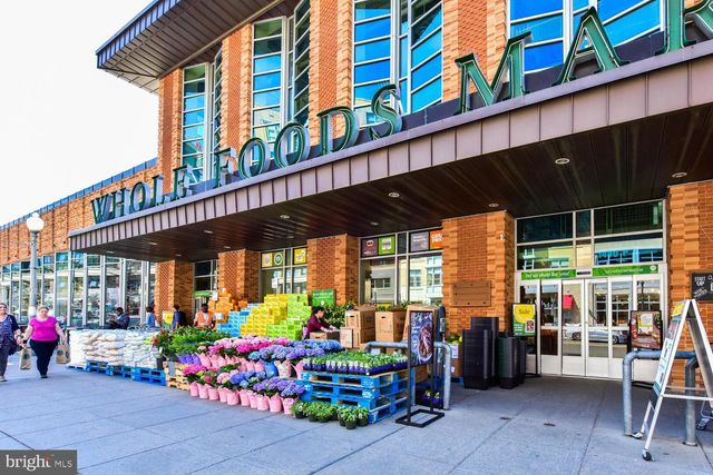 a view of a balcony with sitting area