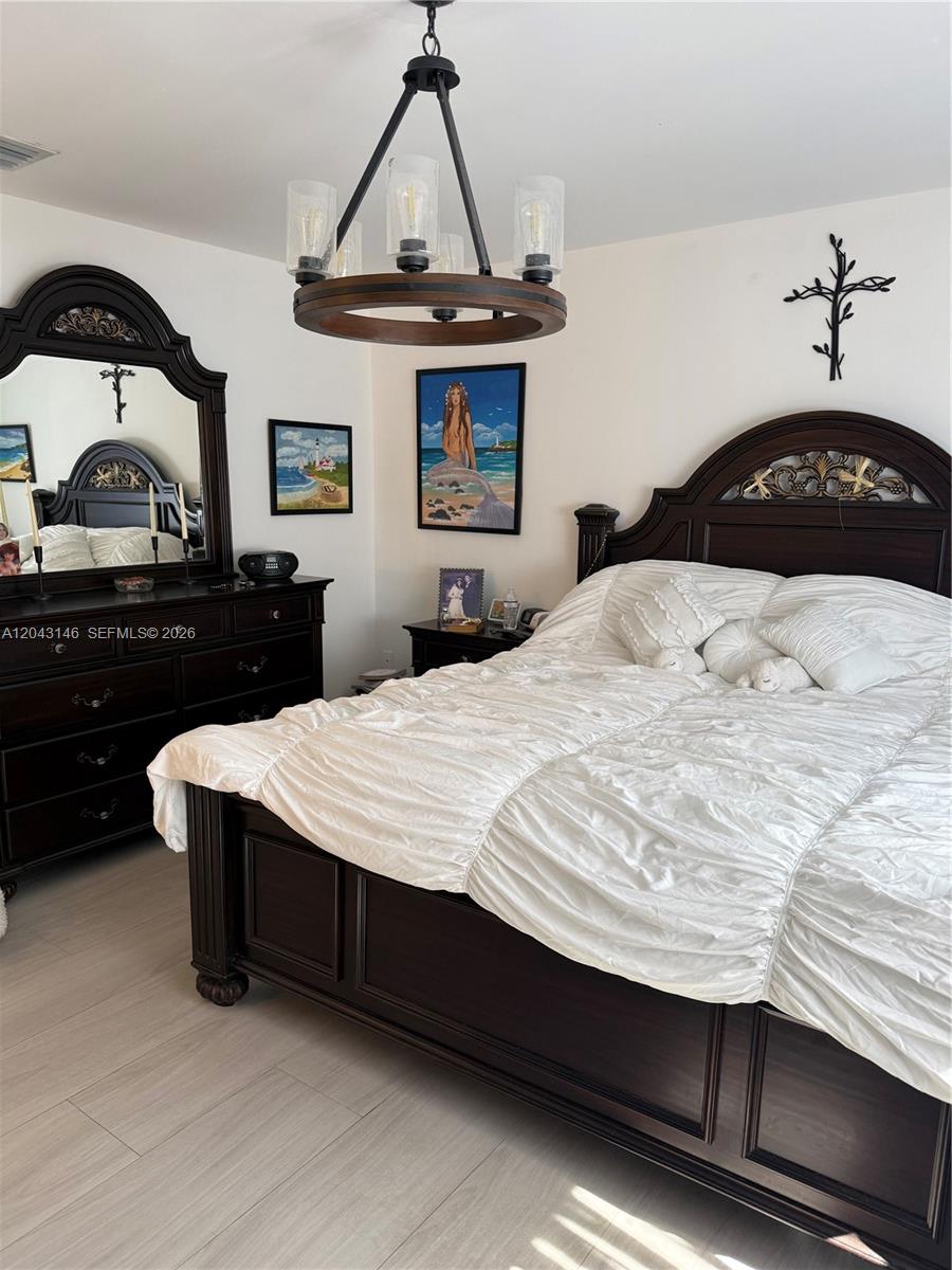 4947 Southwest 143rd Avenue Miami, FL 33175 - Photo 13 of 19 The Master bedroom is large enough to have two large dressers and two large nightstands with a king size bed.