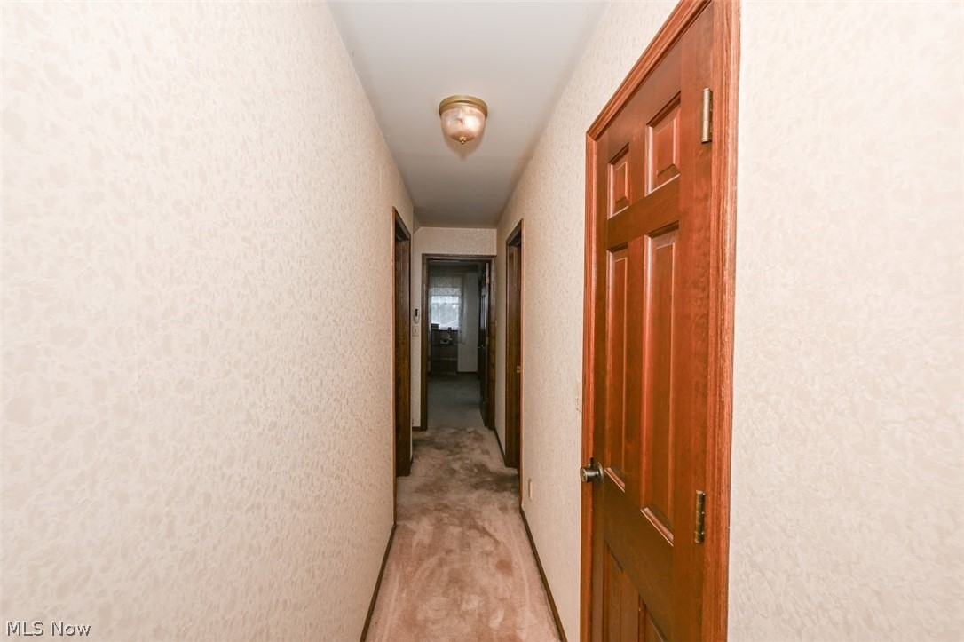 758 Inverness Road Akron, OH 44313 - Photo 30 of 46 Upstairs hallway - notice the beautiful six panel wood doors!