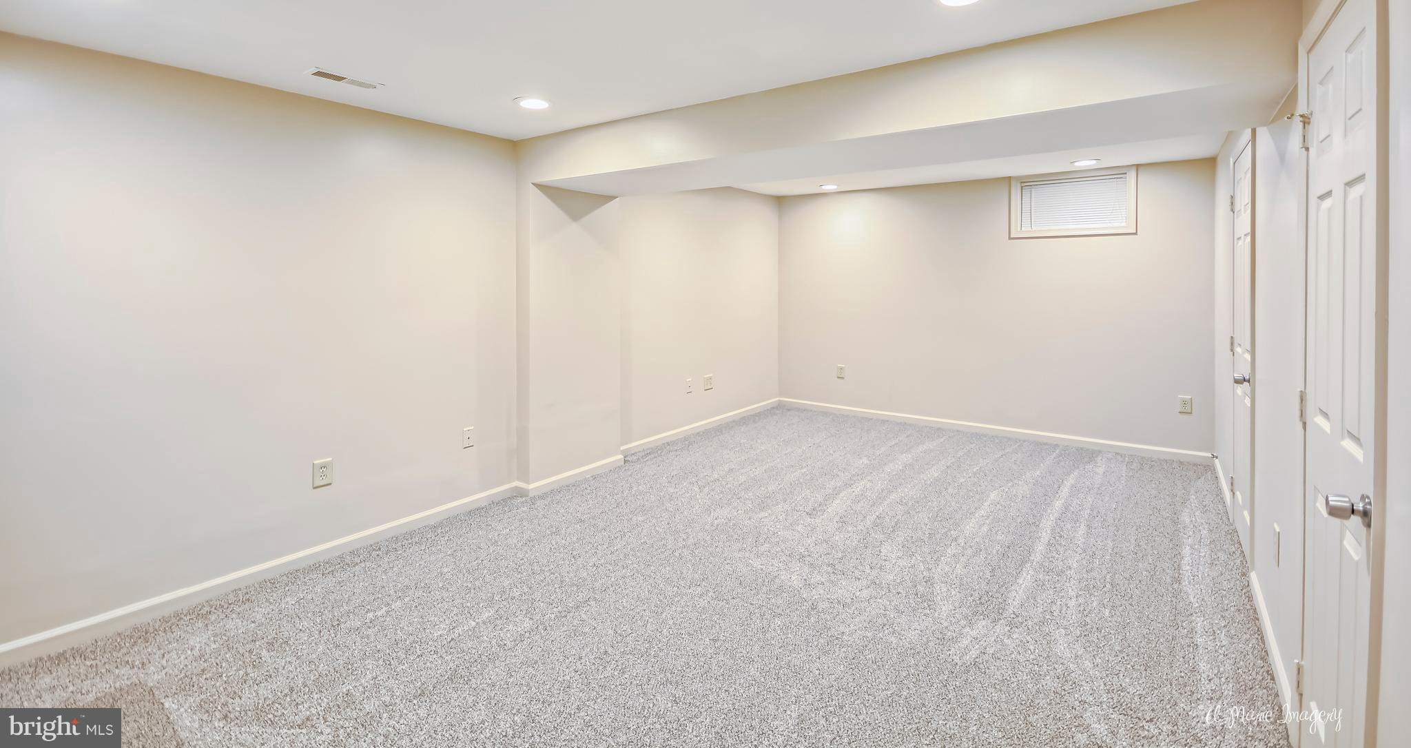 2409 Prentice Court Frederick, MD 21702 - Photo 22 of 30 Lower level family room