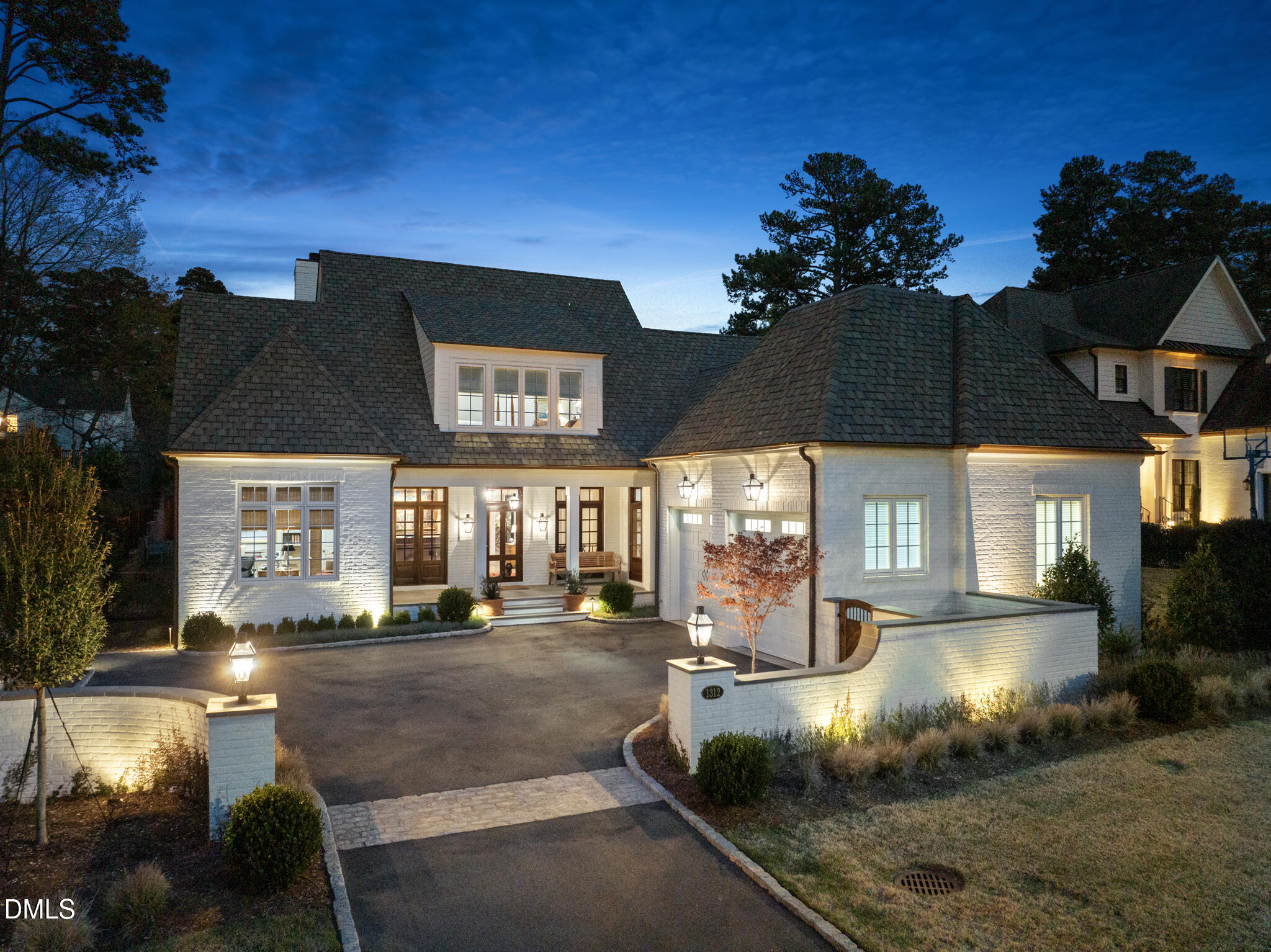 1312 Duplin Road Raleigh, NC 27607 - Photo 1 of 90 a front view of a house with a yard