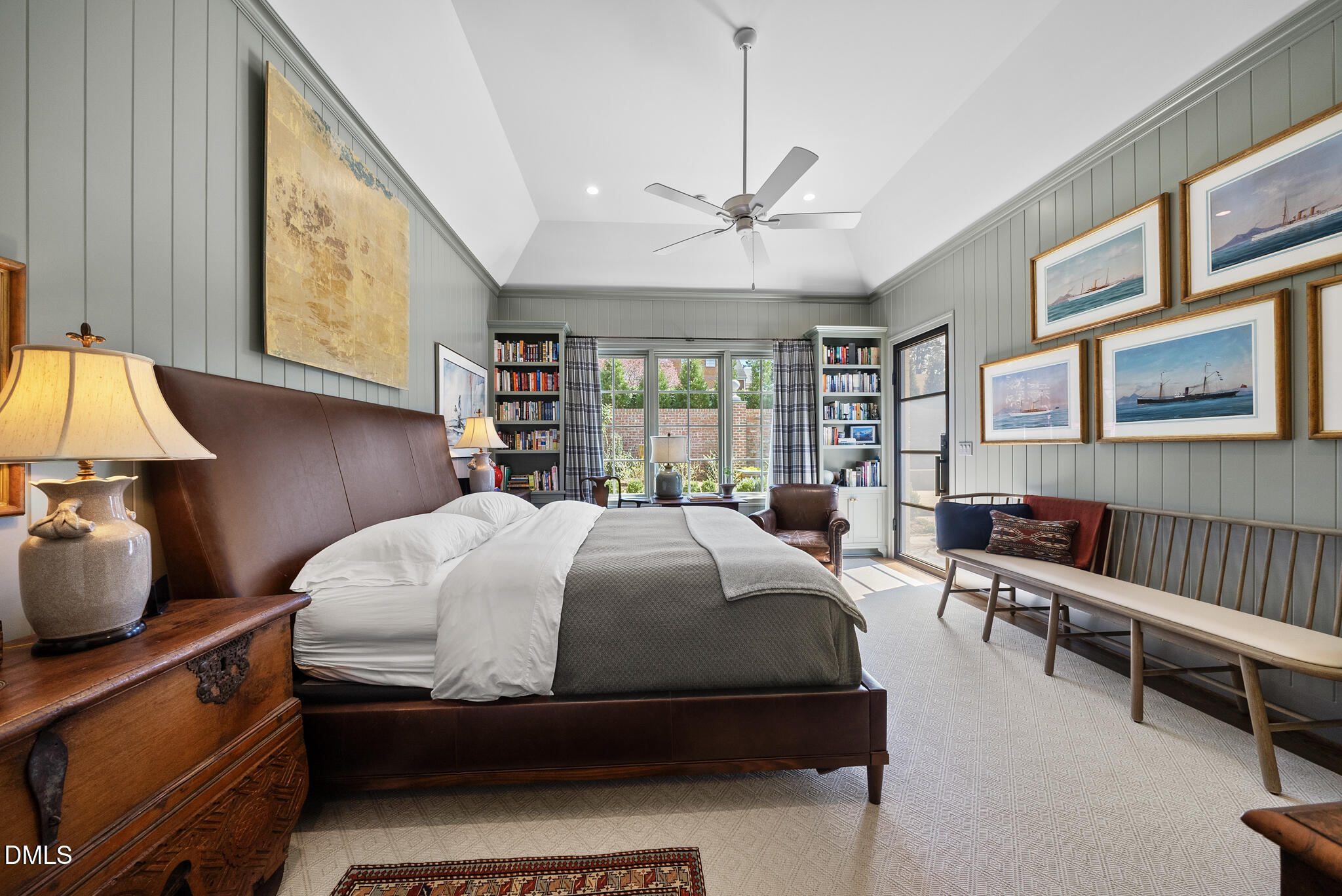 1312 Duplin Road Raleigh, NC 27607 - Photo 36 of 90 a bedroom with a bed and wooden floor