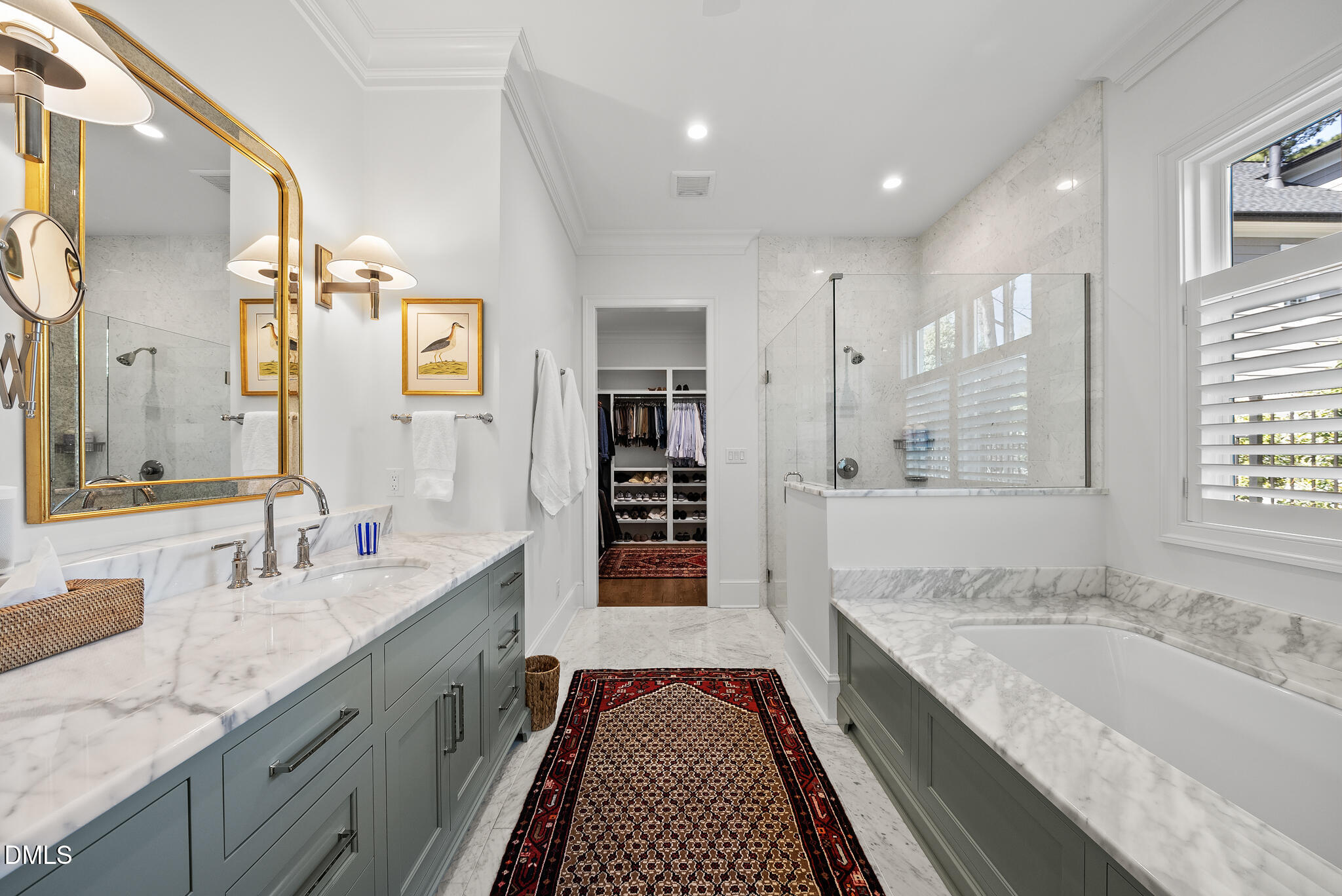 1312 Duplin Road Raleigh, NC 27607 - Photo 39 of 90 a spacious bathroom with a granite countertop double vanity sink a mirror and a bathtub