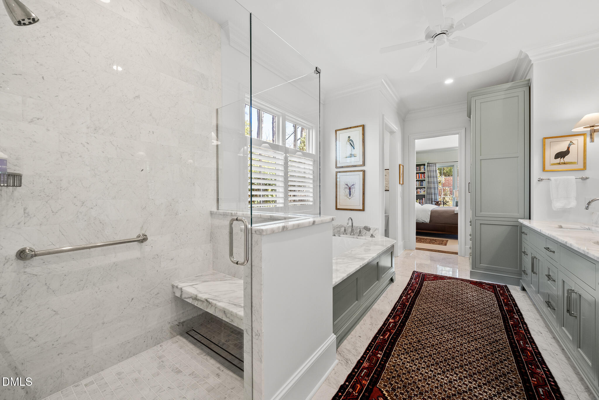 1312 Duplin Road Raleigh, NC 27607 - Photo 40 of 90 a spacious bathroom with a double vanity sink a mirror and a shower