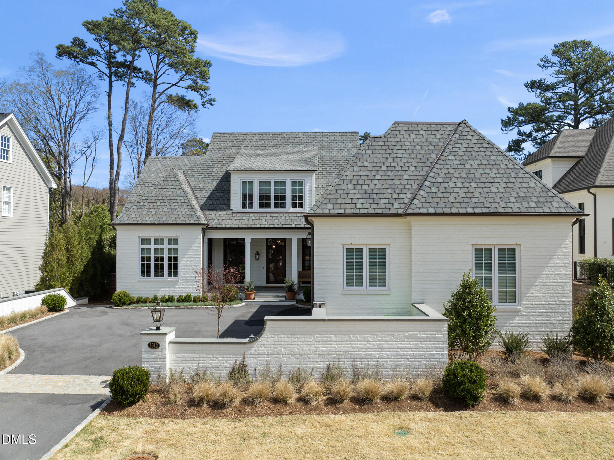 1312 Duplin Road Raleigh, NC 27607 - Photo 4 of 90 a front view of a house with garden
