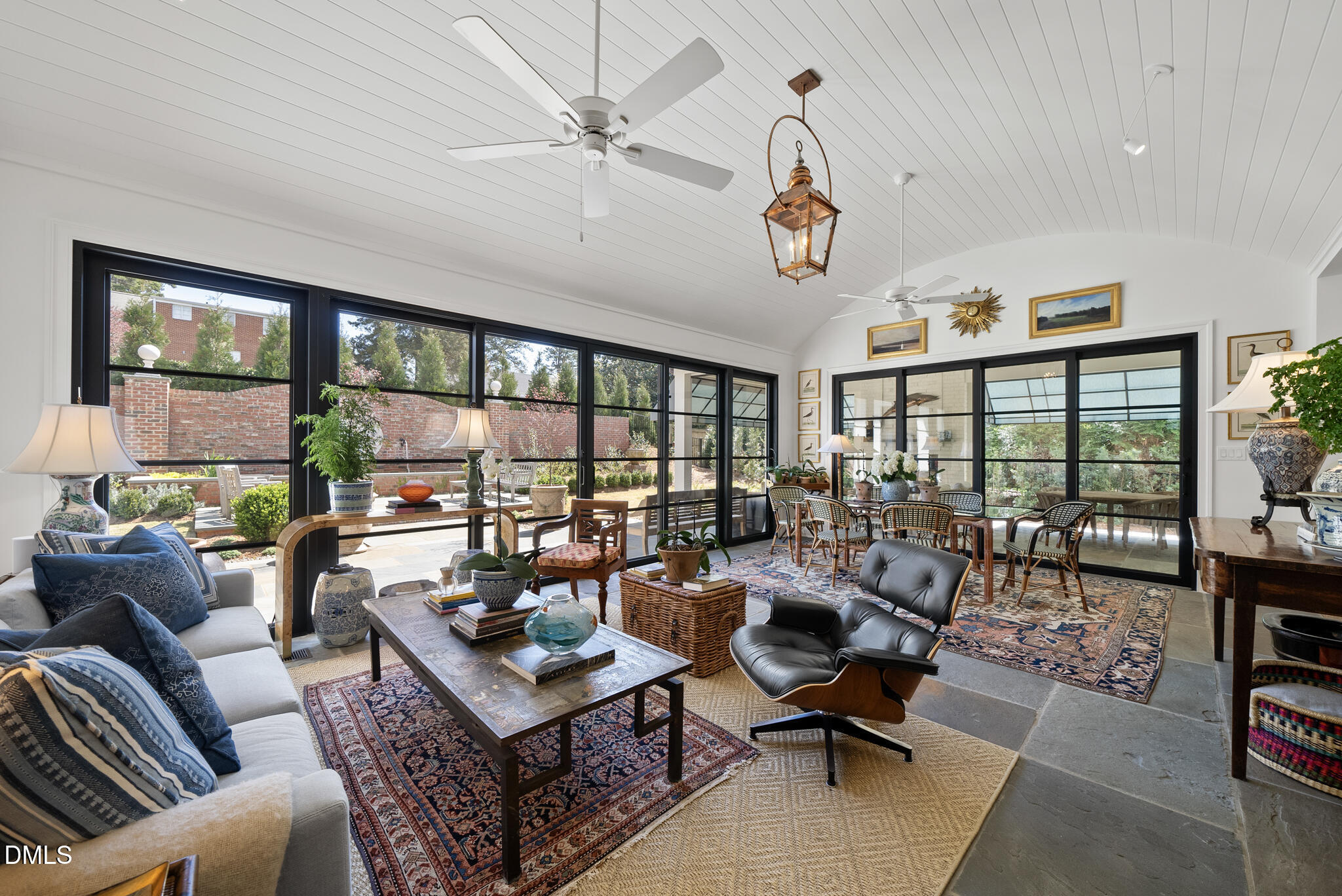 1312 Duplin Road Raleigh, NC 27607 - Photo 50 of 90 a living room with lots of furniture and a large window