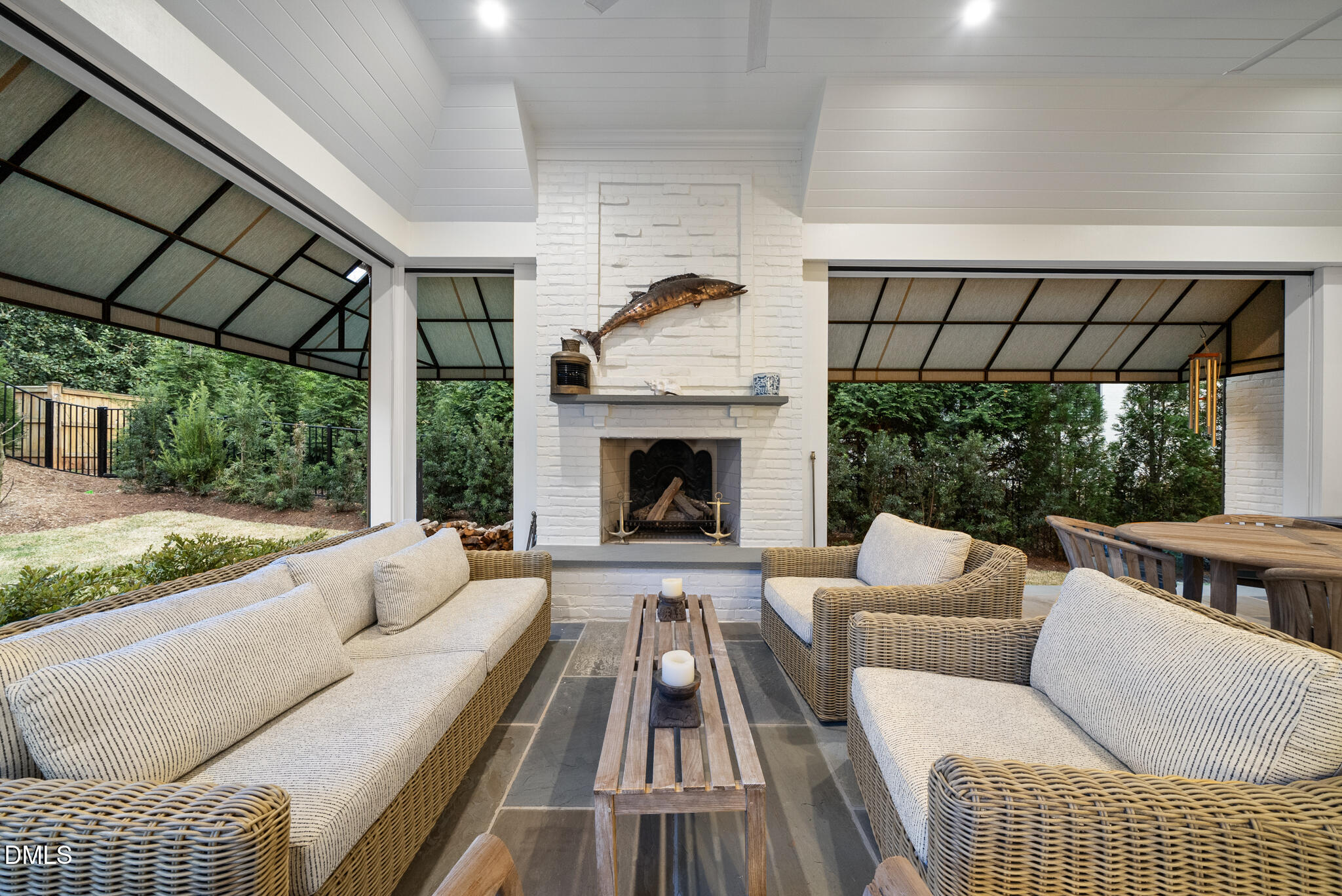 1312 Duplin Road Raleigh, NC 27607 - Photo 65 of 90 a living room with furniture and a fireplace