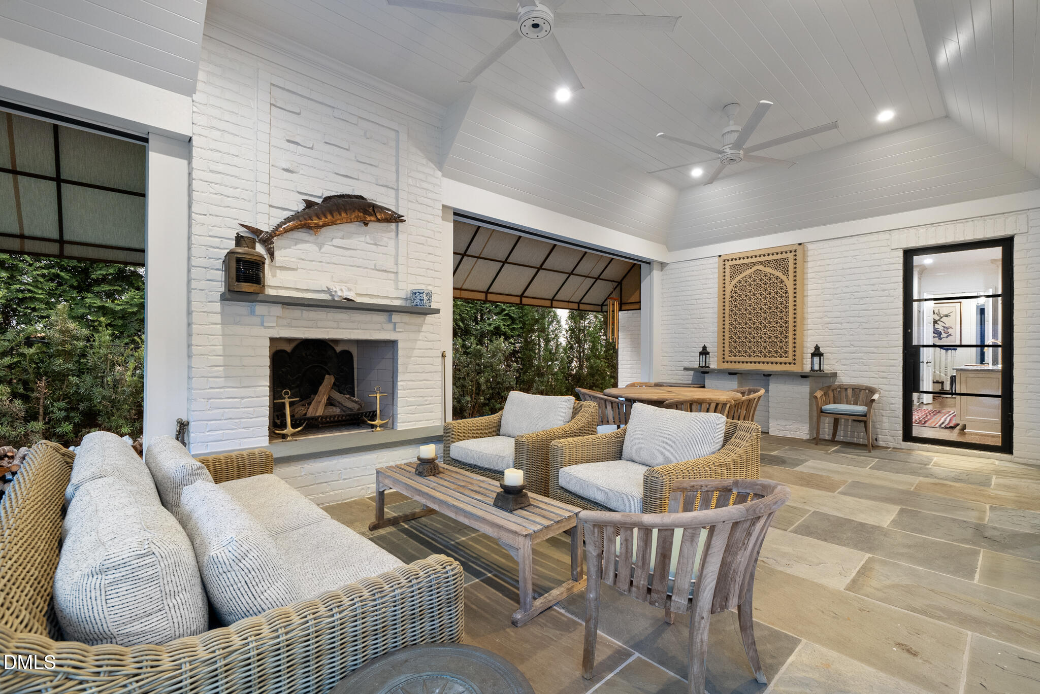 1312 Duplin Road Raleigh, NC 27607 - Photo 82 of 90 a living room with furniture fireplace and a table