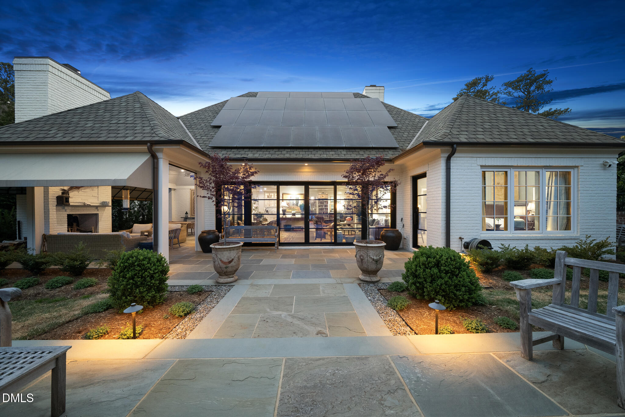 1312 Duplin Road Raleigh, NC 27607 - Photo 87 of 90 a view of a house with backyard porch and sitting area