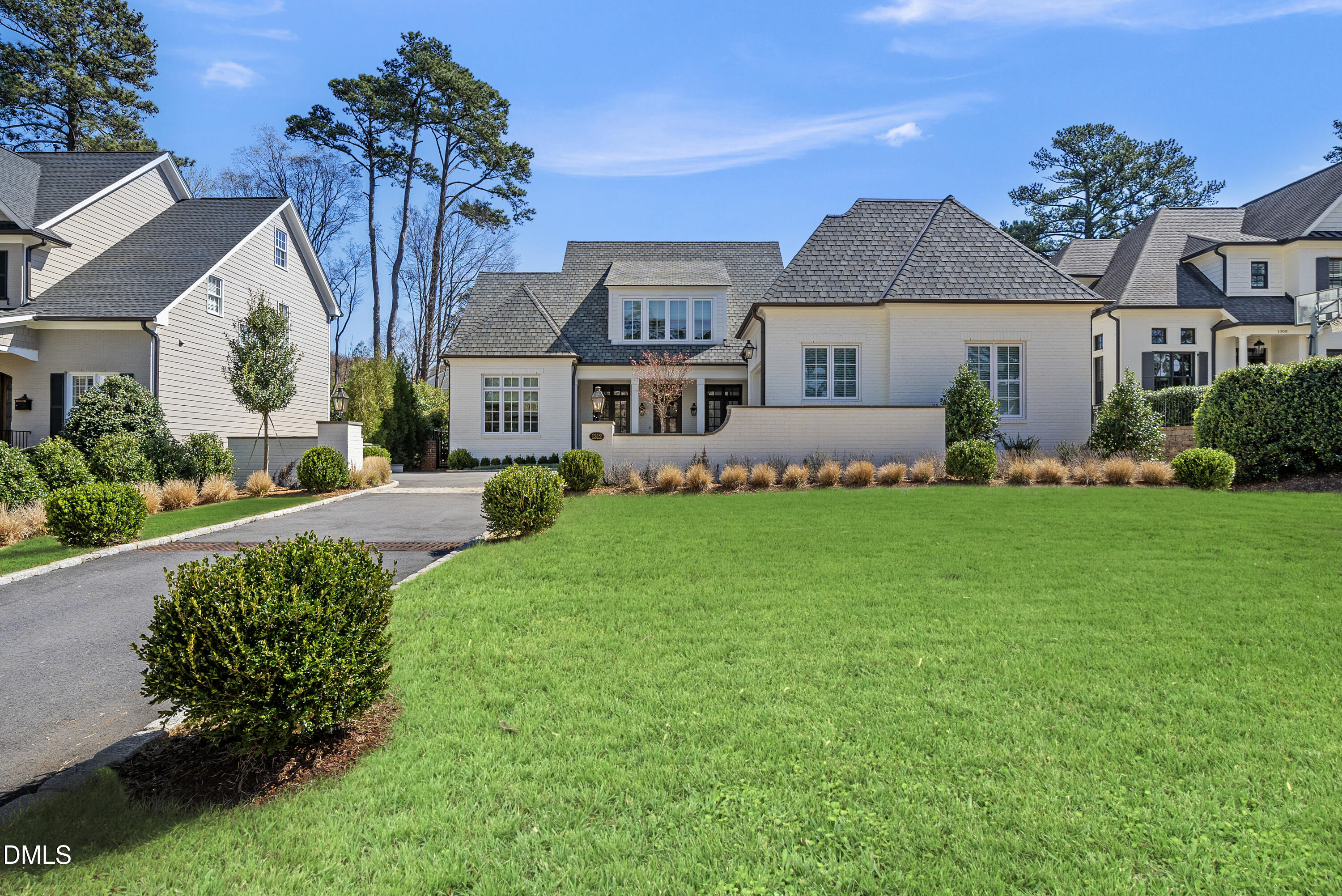 1312 Duplin Road Raleigh, NC 27607 - Photo 90 of 90 a front view of a house with a garden and plants